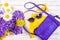 Womans accessories background with handbags, neckerchief, sunglasses and flowers. Summer womans outfits