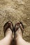 Womans feet and legs in sandals. Blurred