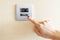 Womans finger on air conditioner switch control