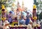 Womans on flower decorated cart