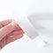 Womans Hand Holding Blank Adhesive Tape Roll on White Background