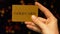 Womans hand holding gold card, benefits for VIP clients in casino, gambling