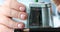 Womans hand sharpening pencil with electric sharpener 4k movie