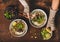 Womans hands with chopsticks and lime over vietnamese Pho-Ga soup