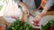 Womans hands cutting radish with knife for salad. Cooking fresh and healthy food. HD slowmotion