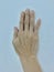 Womanâ€™s hand, fingers, little finger bend, cement wall