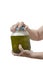 Womanâ€™s Hands Trying To Open Pickle Jar  On White