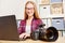 Women as a photographer doing data backup