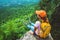 Women asians travel relax in the holiday. Sit Take a photo on the cliff