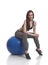 Women athlete sitting on a fitness ball