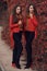 Women autumn clothes set. Two Young beautiful brunette twins in