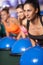 Women balancing on bosu ball