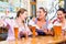 Women in Bavarian pub playing cards