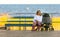 Women on Beach Boardwalk