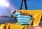 Women beachwear  on wooden bench  hat with blue bow and hand bag and yellow towel  accessory, on horizon sea wave spl