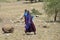 Women belonging to tribes of Maasai walking in the bush