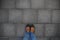 Women Black casual shoes standing and resting on asphalt concrete floor with square tiles. Top View. Concrete floor texture