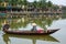 Women in Boat in Hoi An Old Town Canal