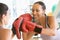 Women Boxing Together At Gym