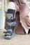 women broken feet with a grey plastic boot ankle brace injury protecting boot