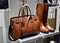 Women brown boots and leather bag