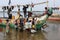 Women buy fish in Ada Foah, Ghana.