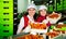 Women calibrating harvested apricots