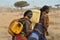 Women carrying water in Ethiopia