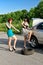 Women changing a tire