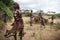 Women and children from the Hamer tribe are preparing for the Bull Jump ceremony.Ethiopia,Turmi village, Omo valley.