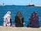 Women chilling out at the harbour. Sousse. Tunisia