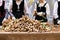 Women cleaning spring onion for cook and eat. Holiday of spring onion in Spain