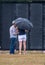 Women come to the traveling wall, even during a light rain