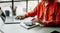 Women counting coins on calculator taking from the piggy bank. hand holding pen working on calculator to calculate on desk about