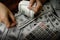 women counting money on a stack of 100 US dollars banknotes a lot of