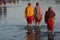 Women Crossing the river. Morning at Beneshwar Fair, India