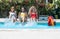 Women of different ethnicities in swimsuits having fun in the pool. gay pride concept