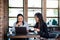 Women discussing business and having a coffee