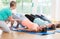 Women doing exercises for pelvis floor in postnatal regression c