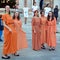 Women dressed as Roman priestess for tourists in the Old Town of Pula