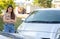 Women drivers sad after a car accident because not have car accident insurance