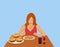 Women are eating fast food on a brown wooden table