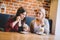 Women eating healthy dessert in a restaurant.