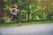 Women exercise on the street. Nature park. Girl who is lifting legs to exercise. exercise, running, Girl who is running jogging