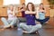 Women exercising in fitness center