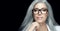 Women eyewear. Stylish silver hair woman in clear glasses staring at camera with confidence in herself. Eyewear banner isolated on