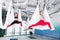 Women feeling cheerful doing antigravity yoga together