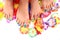 Women feet (pedicure) with flowers