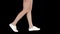 Women feet wearing white sneaker shoes walking, Alpha Channel