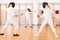 Women fencers in duel at fencing sparring